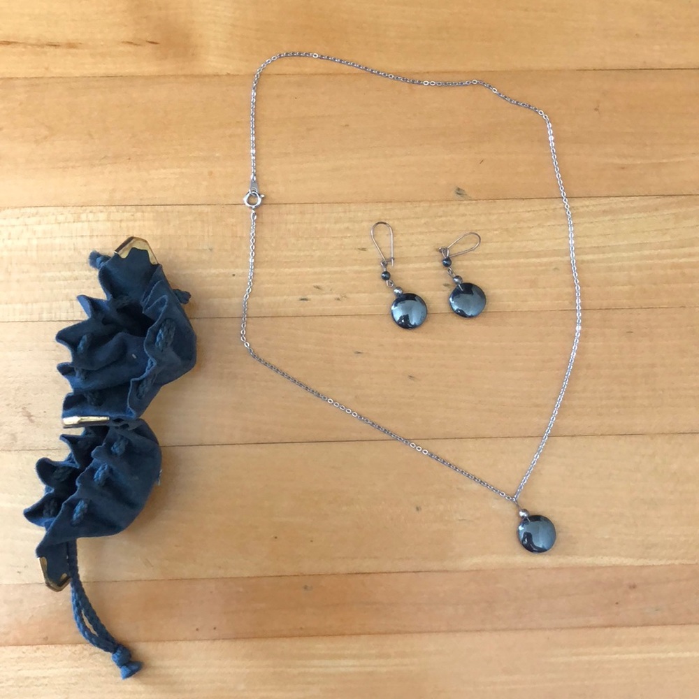 Black earrings with matching necklace